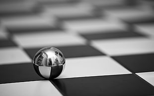 stainless steel ball on black and white checkered board digital wallpaper HD wallpaper
